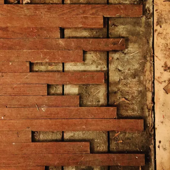 Laying down some wood.